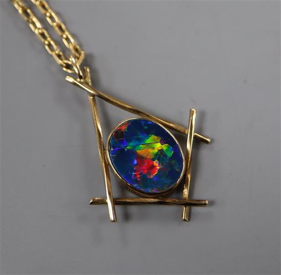 A black opal doublet pendant on 9ct chain